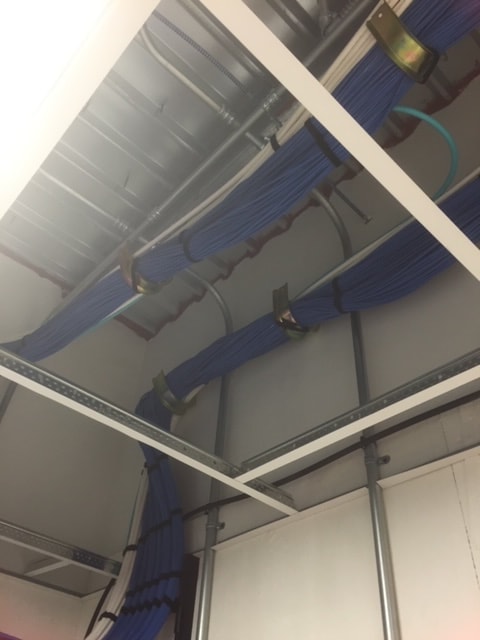 Conduit and cabling on commercial ceiling